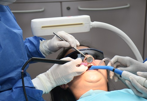 Shielding dental professionals and patients
